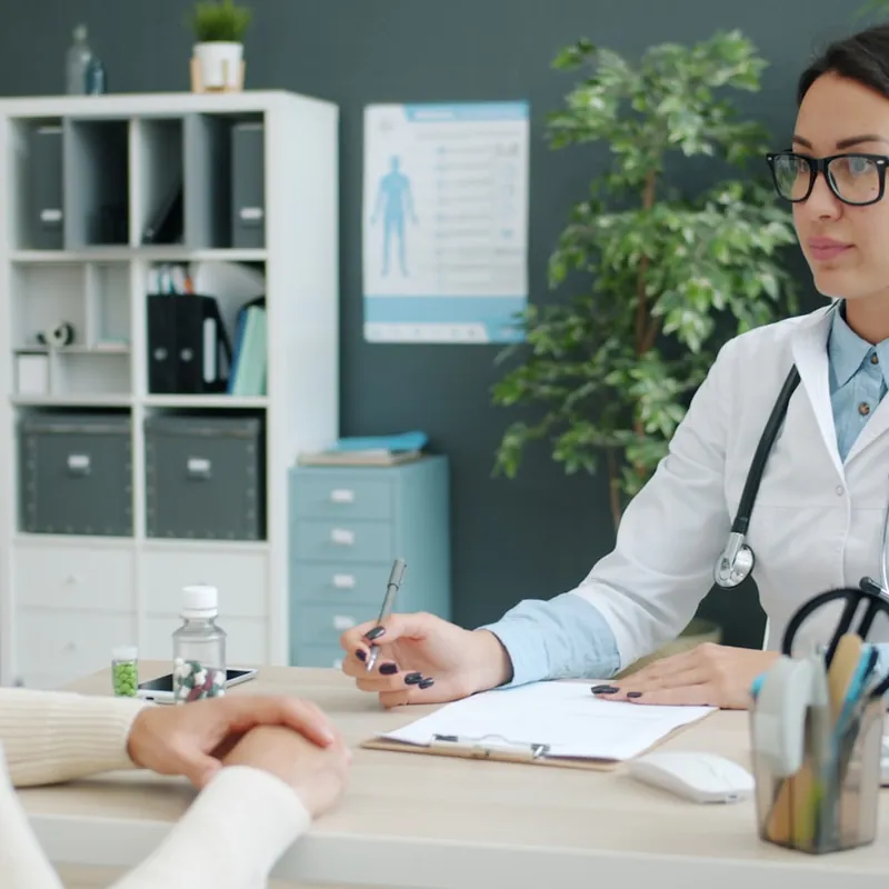 Doctor consulting with patient